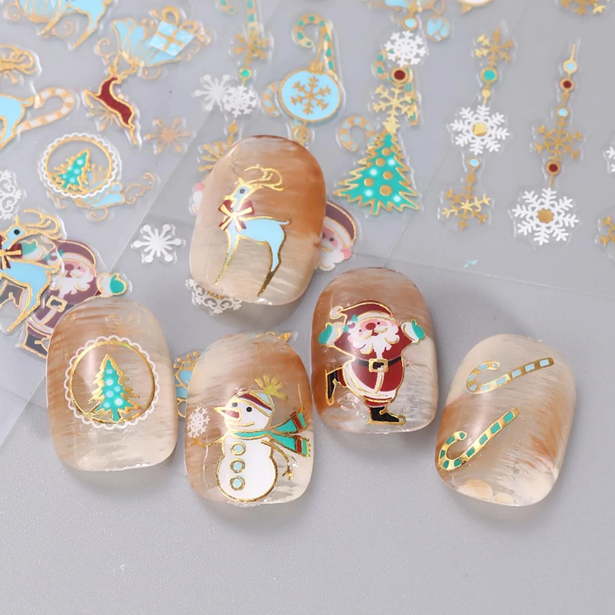 10 Sheets Christmas Nail Art Stickers 3D Self-Adhesive Gold Elk Santa Claus Socks Xmas Tree Designs Nail Decals Winter Cute Nail Supplies Gold Snowflake Nail Stickers for Women DIY Holiday Manicure